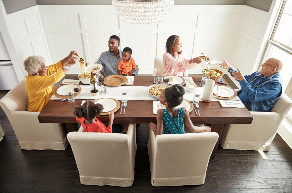 Family having breakfast at the dining table | Chesapeake Family Flooring