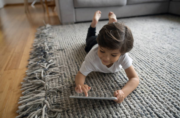 Girl lying on rug | Chesapeake Family Flooring